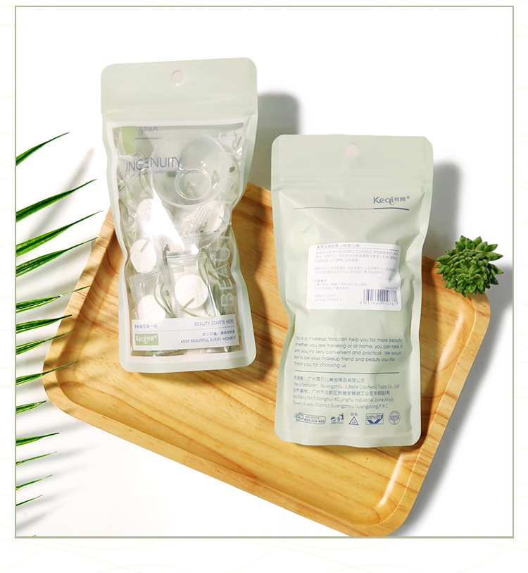 A bag of 24 pieces of facial mask paper + a small bowl of portable candy pie compressed disposable facial mask pieces wet compress hydrating facial mask paper Specification image
