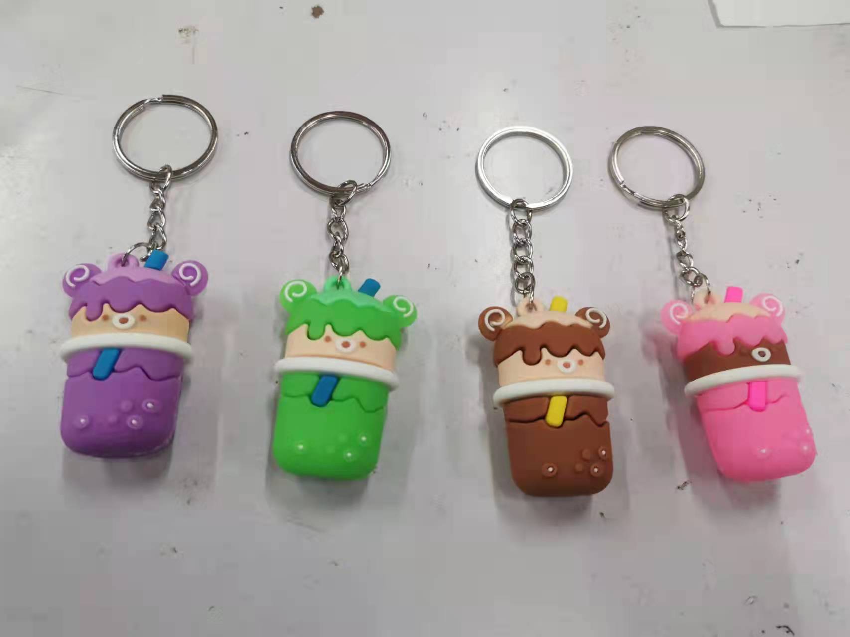 A series of keychain styles of best-selling milk tea bottles are mixed
