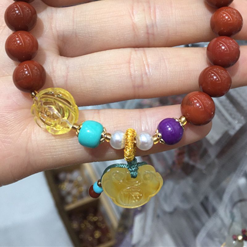 The Liangcai Jingzhu Bao natural Nan Hong bracelet has sufficient water head and a smooth and fine surface Item Picture