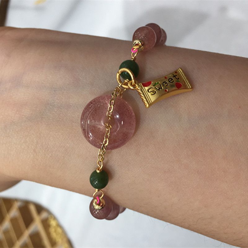 The natural strawberry crystal peace pendant bracelet is bright and colorful with abundant water content Item Picture