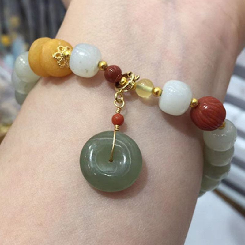The natural Hetian jade peace pendant bracelet with bright crystal jewelry features vivid colors and abundant water content details Picture
