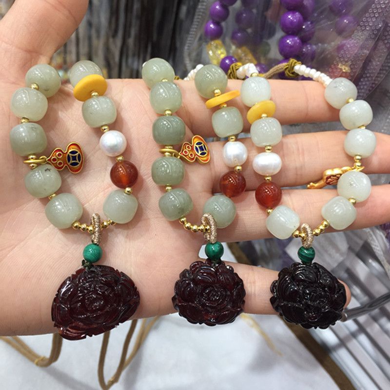 Bright crystal jewelry, natural Hetian jade with blood amber pendant necklace, exquisitely carved with water head foot, smooth and fine surface details Picture