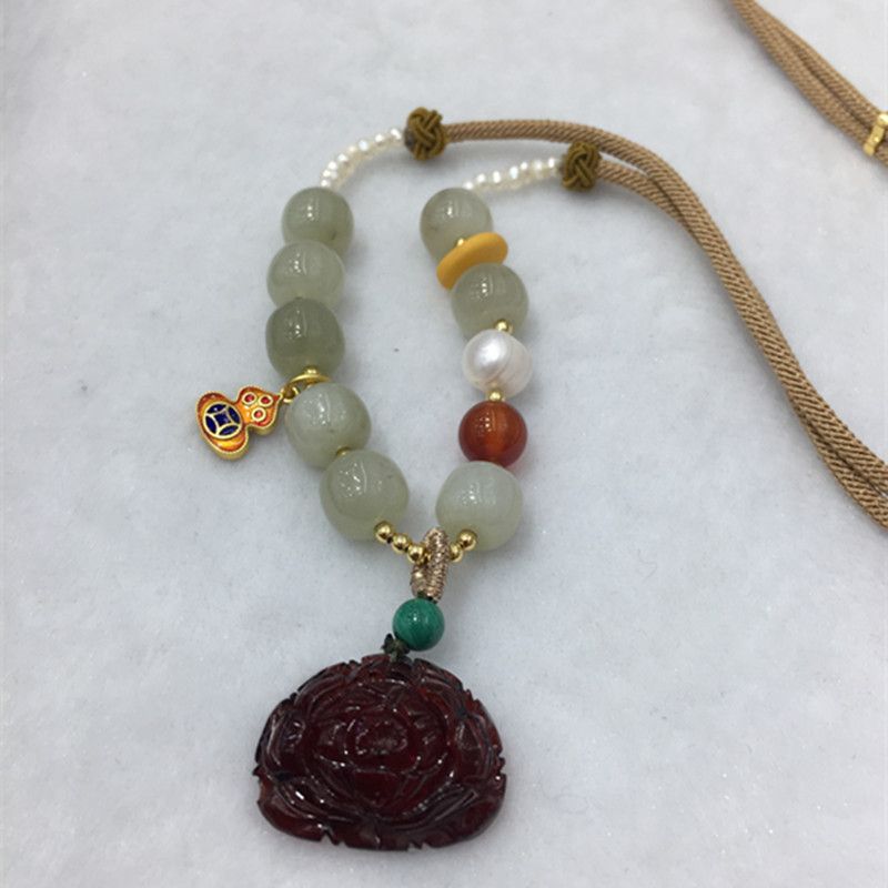 Bright crystal jewelry, natural Hetian jade with blood amber pendant necklace, exquisitely carved with water head foot, smooth and fine surface Application Scenario