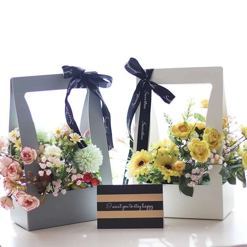 Wholesale and customized new hand-held flower packaging bags, paper bags and hand-held flower baskets