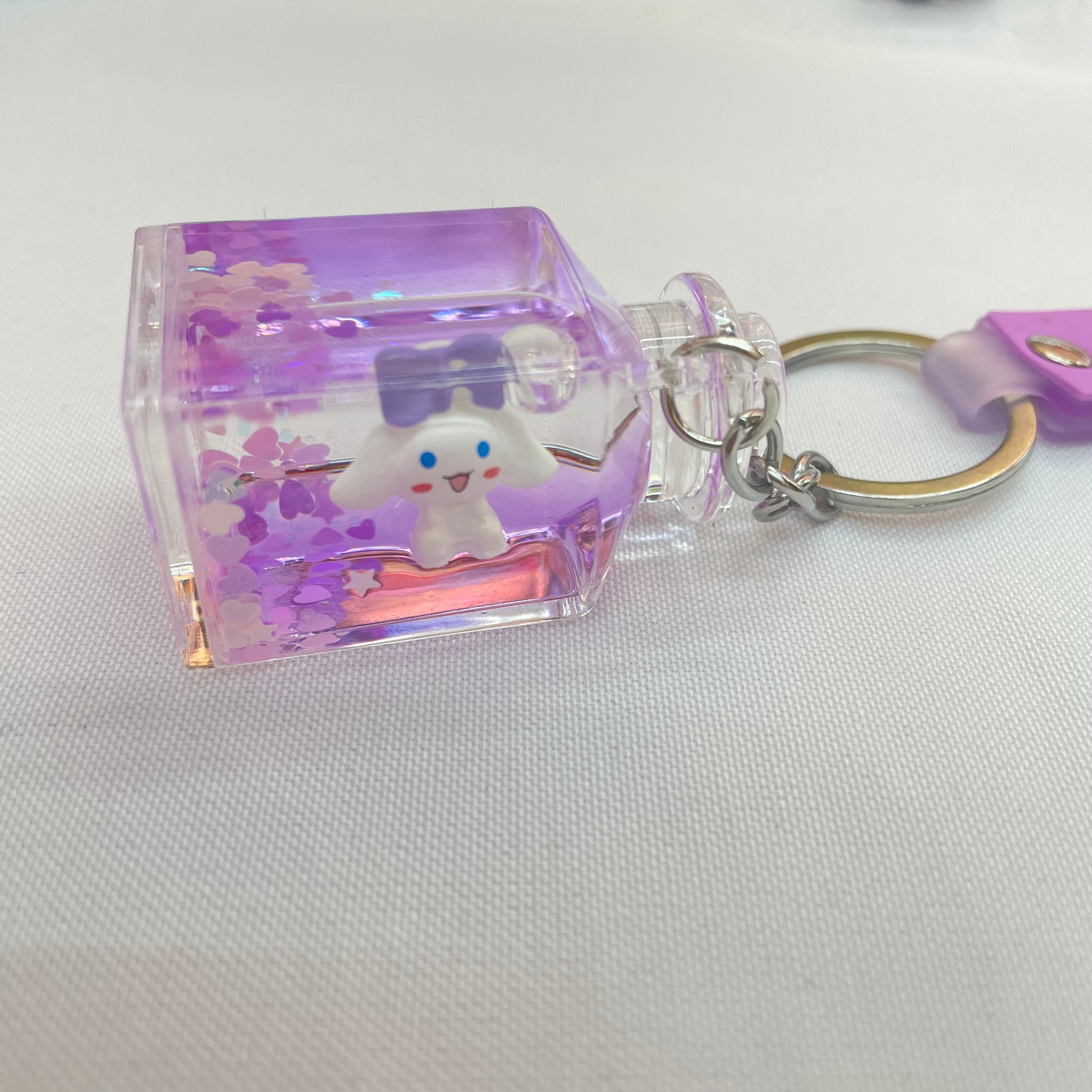 Cute drift bottle, flowing sand liquid floating acrylic pendant, creative cartoon dog floating in oil keychain, schoolbag hanging decoration Specification image