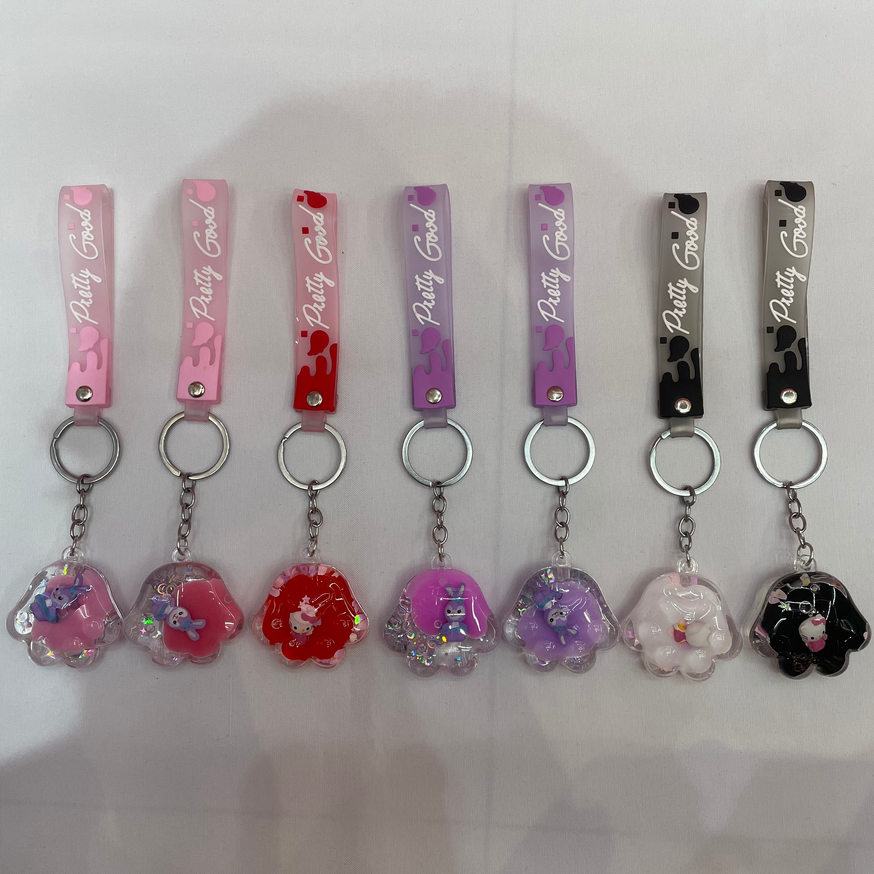 Floating cute animal key chain, oil-filled liquid acrylic key pendant, quicksand schoolbag hanging decoration, key chain details Picture