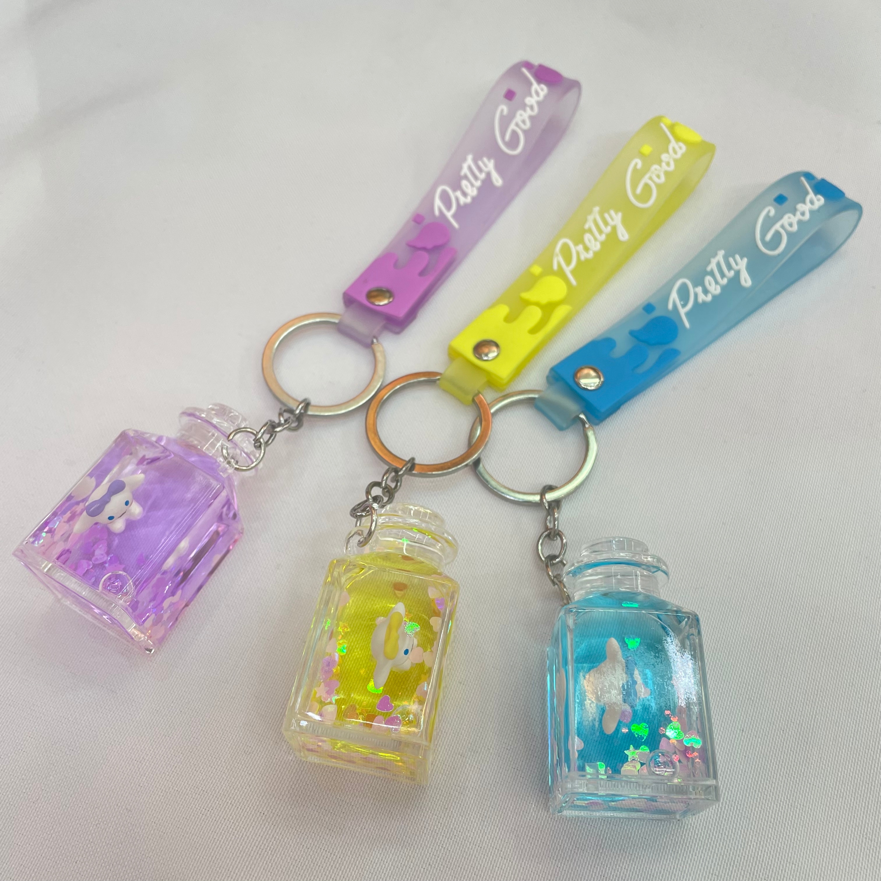 Cute drift bottle, flowing sand liquid floating acrylic pendant, creative cartoon dog floating in oil keychain, schoolbag hanging decoration Item Picture