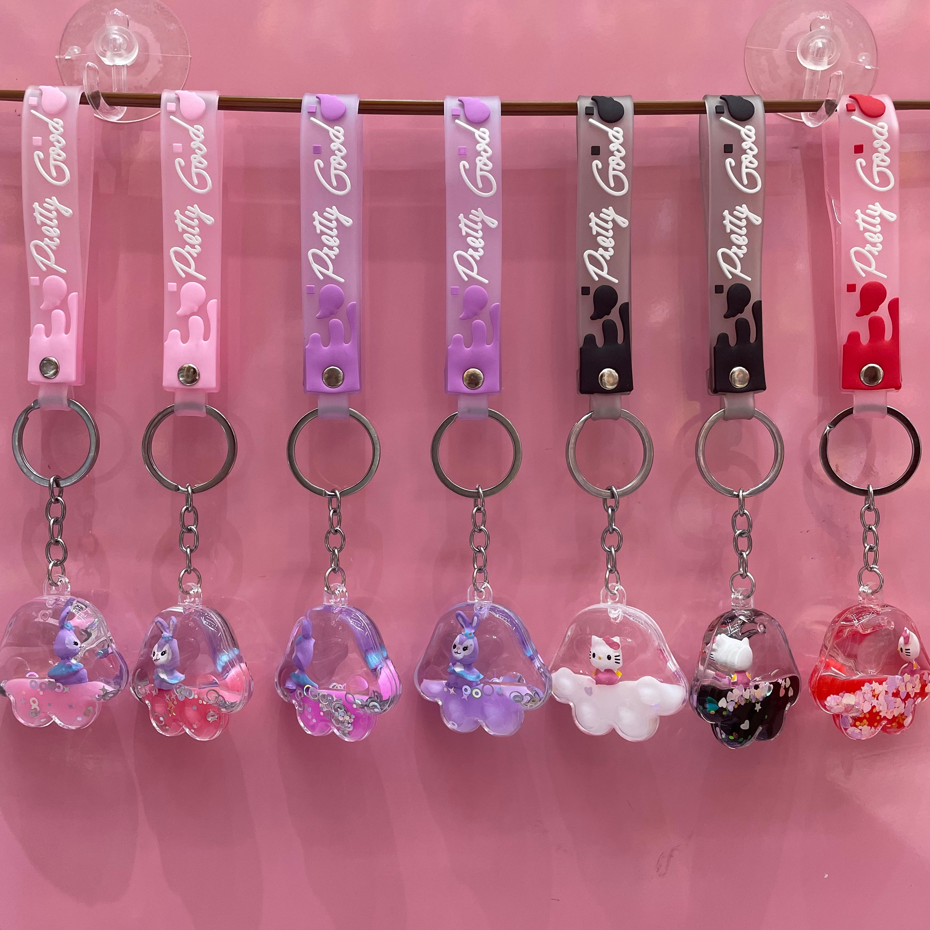 Floating cute animal key chain, oil-filled liquid acrylic key pendant, quicksand schoolbag hanging decoration, key chain
