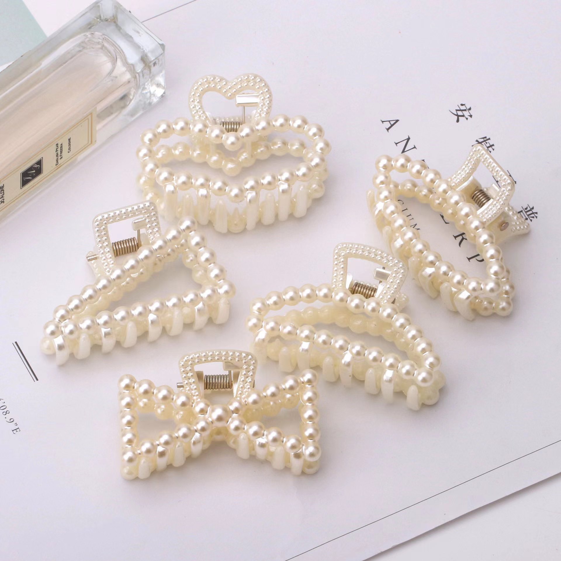 Korean version bow tie large simple shark clip accessory hair clip, women's headwear plastic pearl small hair clip wholesale h-515