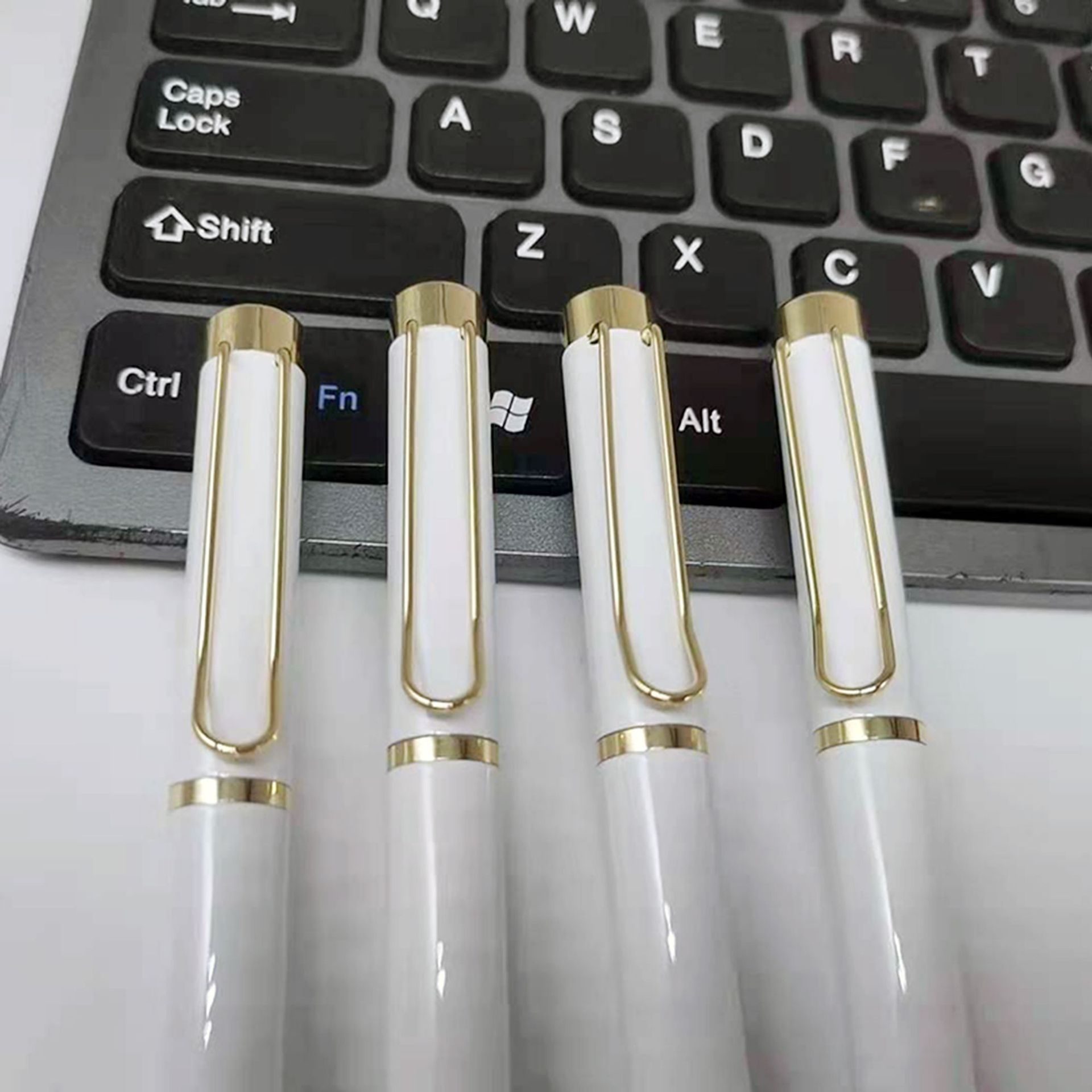 The manufacturer supplies metal wire clamps, ballpoint pens, steel rods, hollow pen clamps, business medium oil pens, advertising ballpoint pens, and business metal pens details Picture