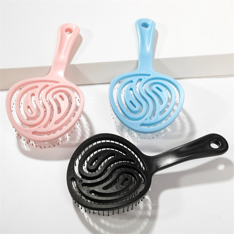  厂家直销棒棒糖圆形镂空彩色塑料按摩梳子