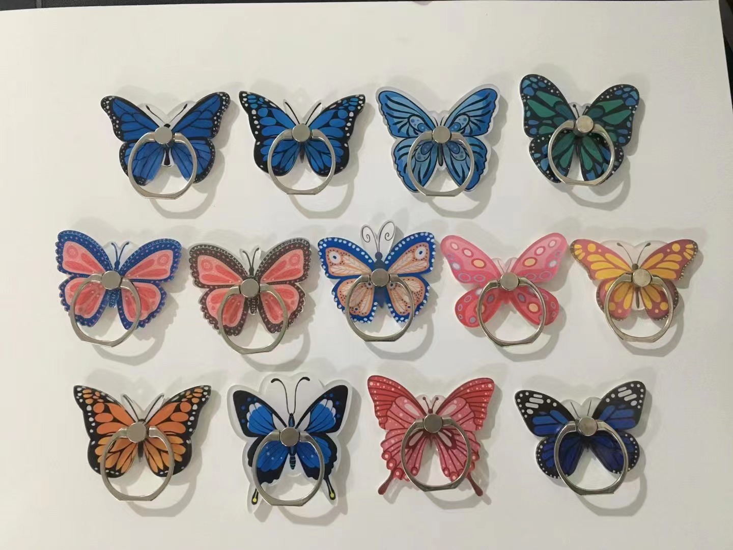 Cartoon animation butterfly ring stand, transparent acrylic glitter pendant, custom logo mobile phone stand based on provided image Application Scenario