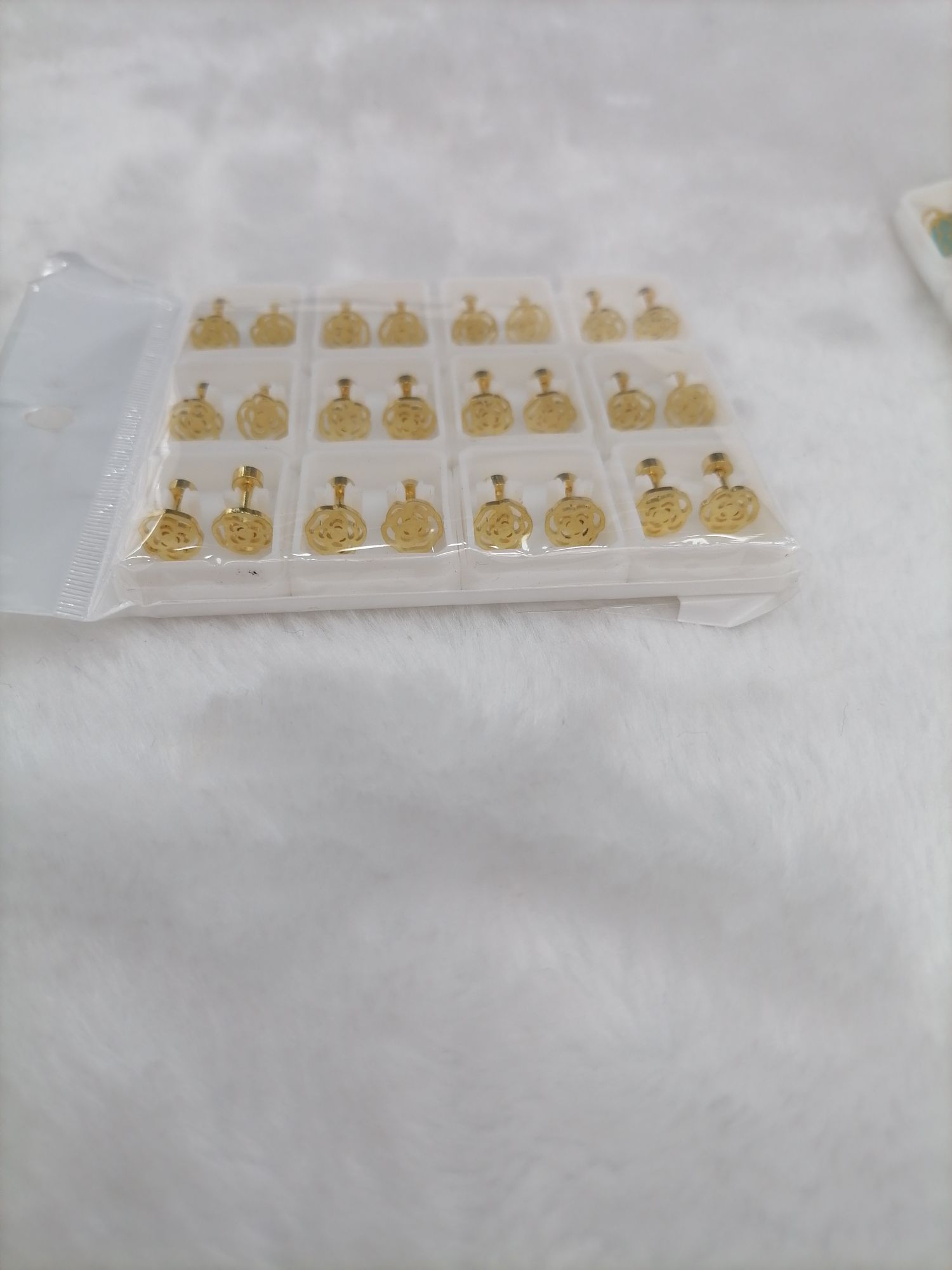 Titanium steel golden hollowed-out rose ear studs details Picture