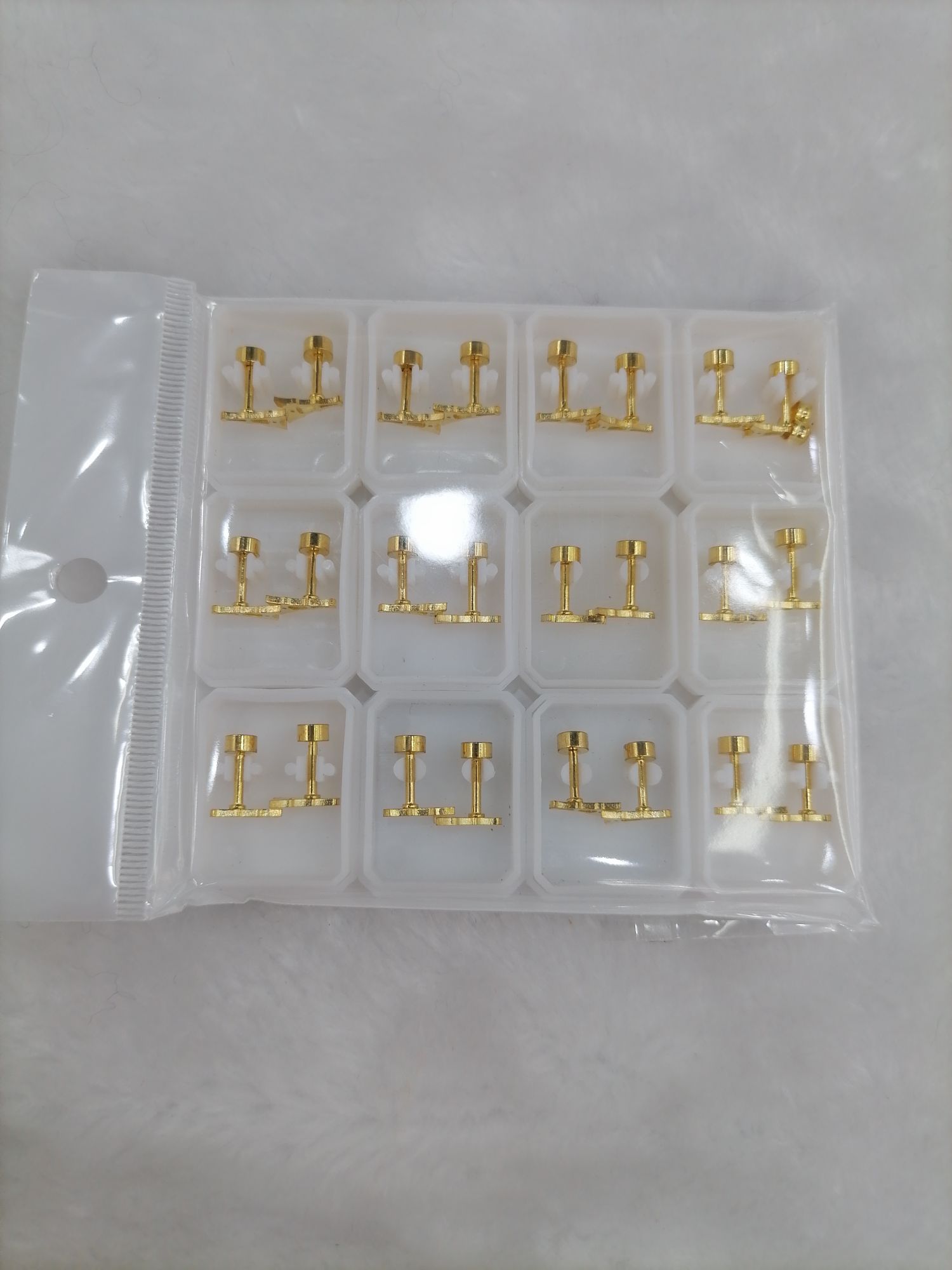 Titanium steel golden hollowed-out pyramid ear studs Specification image