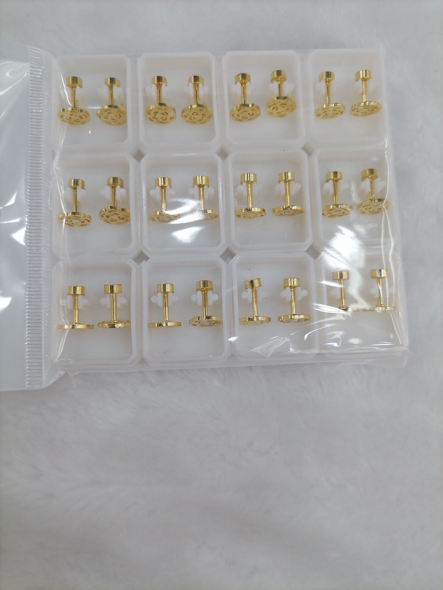 Titanium steel golden hollowed-out rose ear studs Specification image