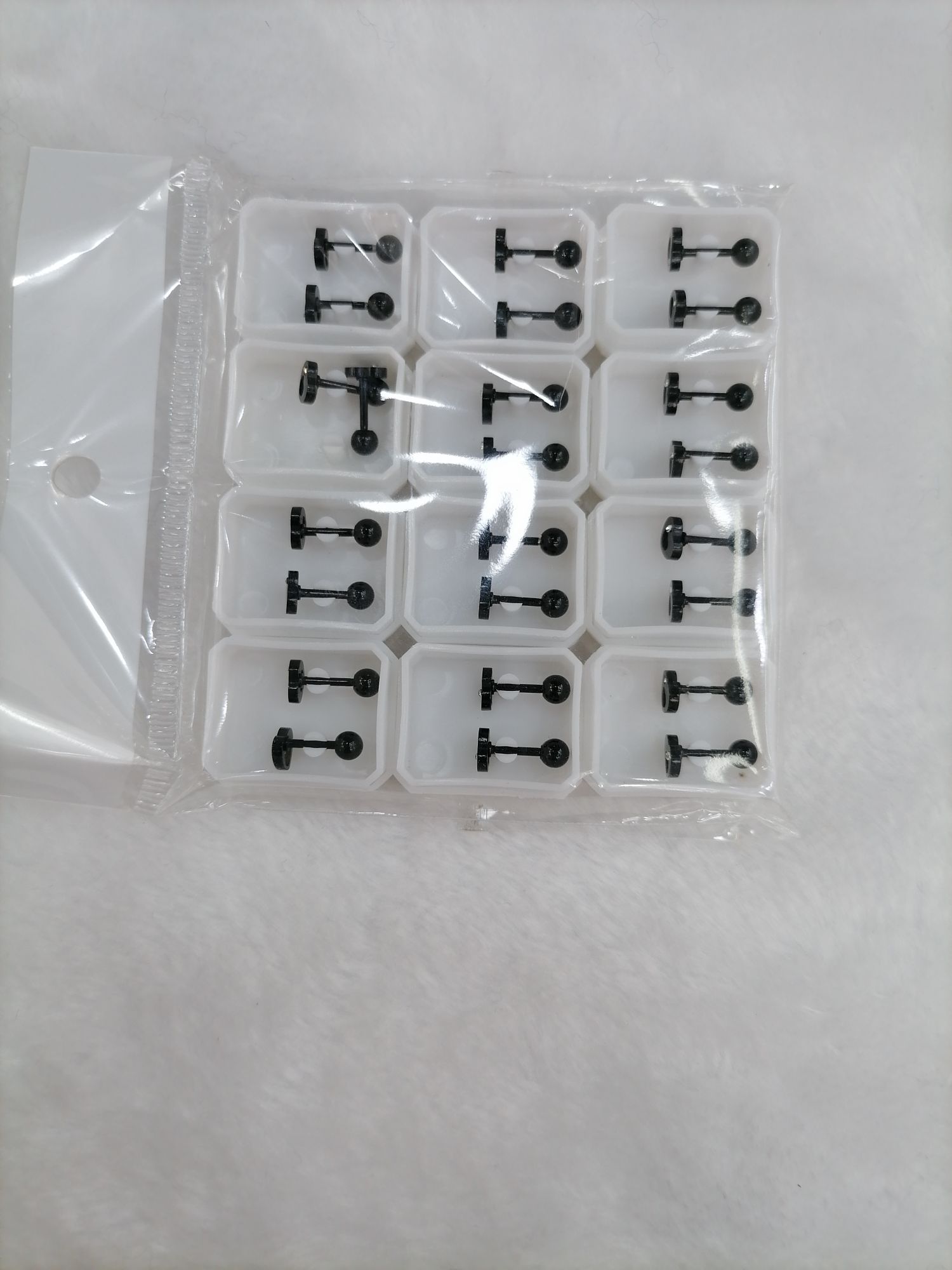 Titanium steel golden hollowed-out ear studs with diamonds Specification image
