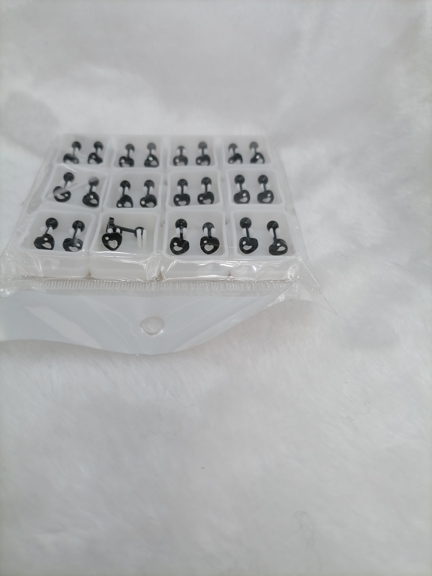 Titanium steel golden hollowed-out ear studs with diamonds