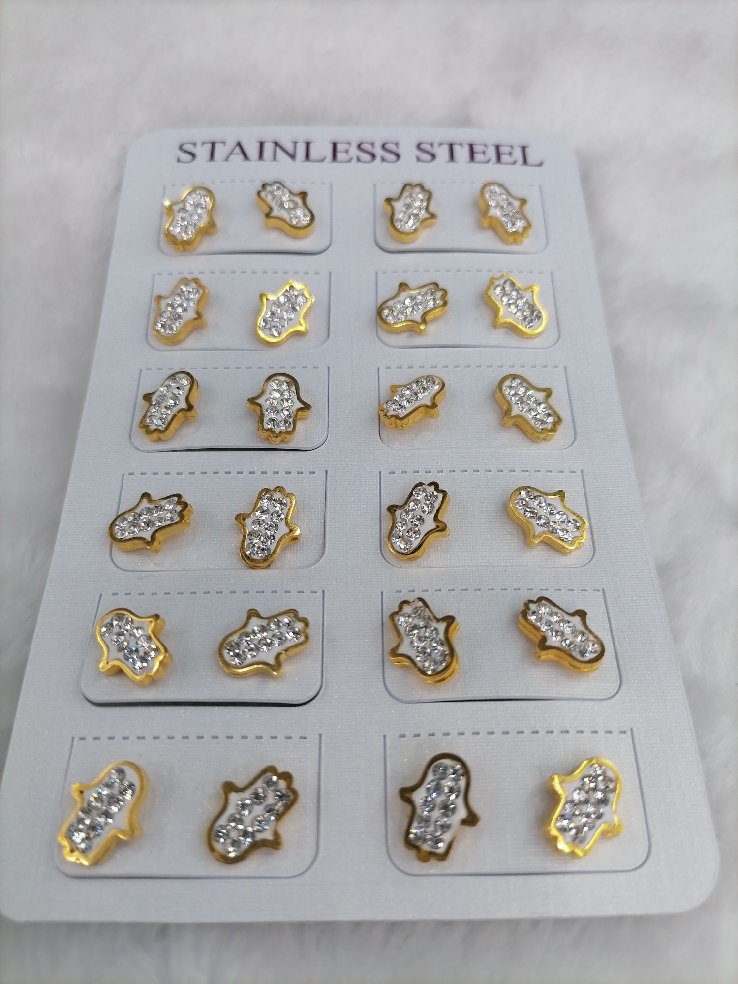 Titanium steel golden small hand with drill ear studs