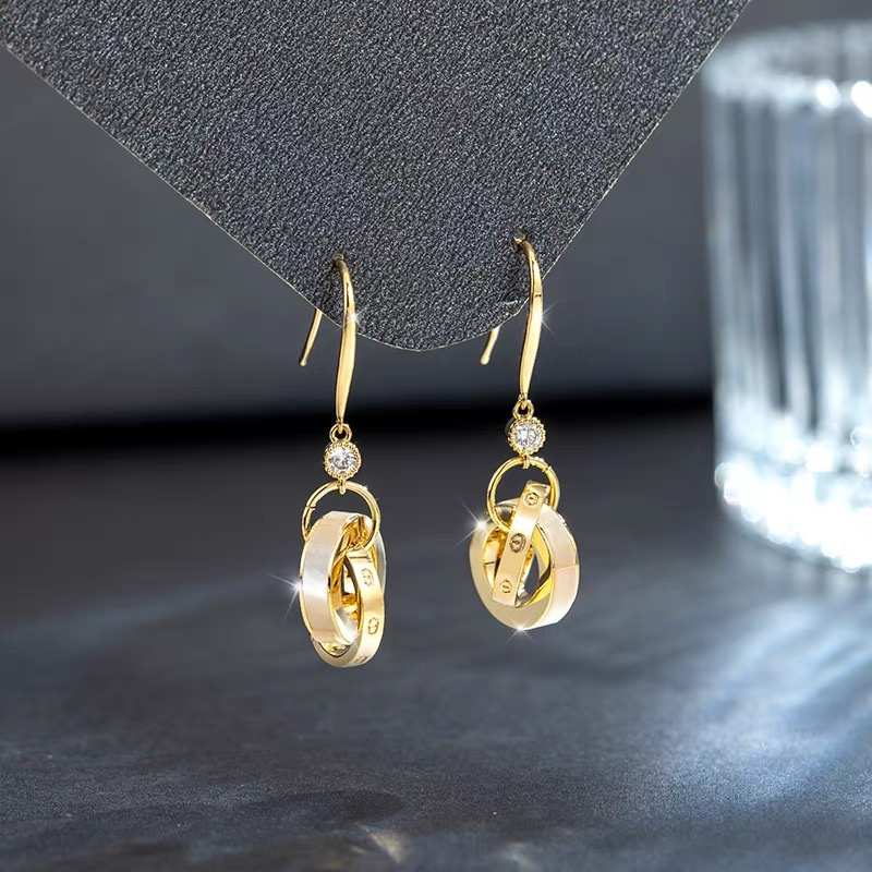 Dingxin Jewelry Earrings 9120030, a popular new product for foreign trade, offers fashionable metal earrings with a European and American style. Wholesale supply from the manufacturer details Picture