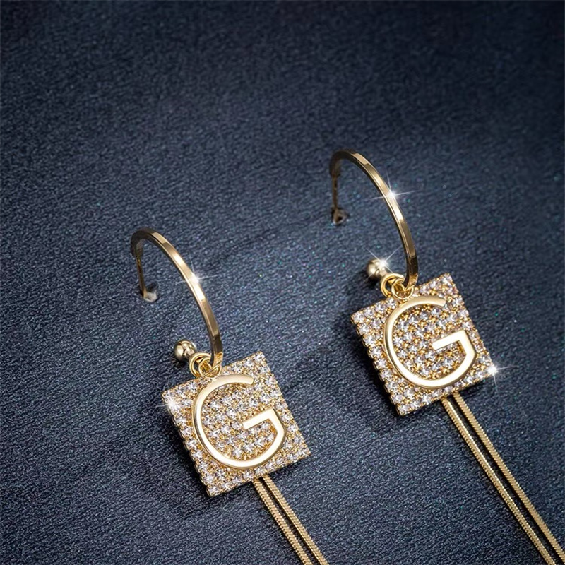 Dingxin Jewelry Earrings 9120072, a popular new product in foreign trade, offers fashionable metal earrings with a European and American style. Wholesale supply from the manufacturer Specification image
