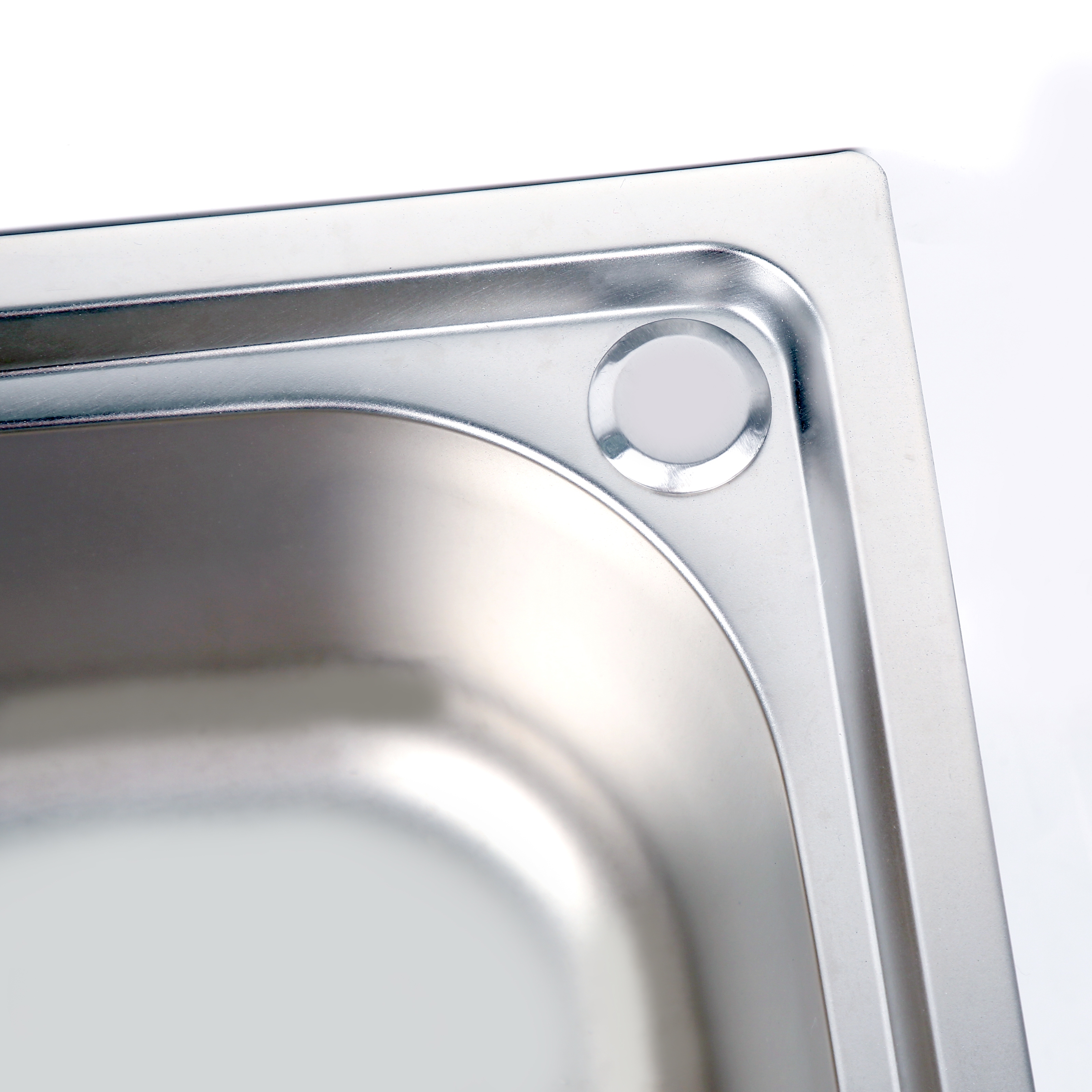 The kitchen uses a stainless steel sink for washing hands, dishes and vegetables. The sink is small Specification image