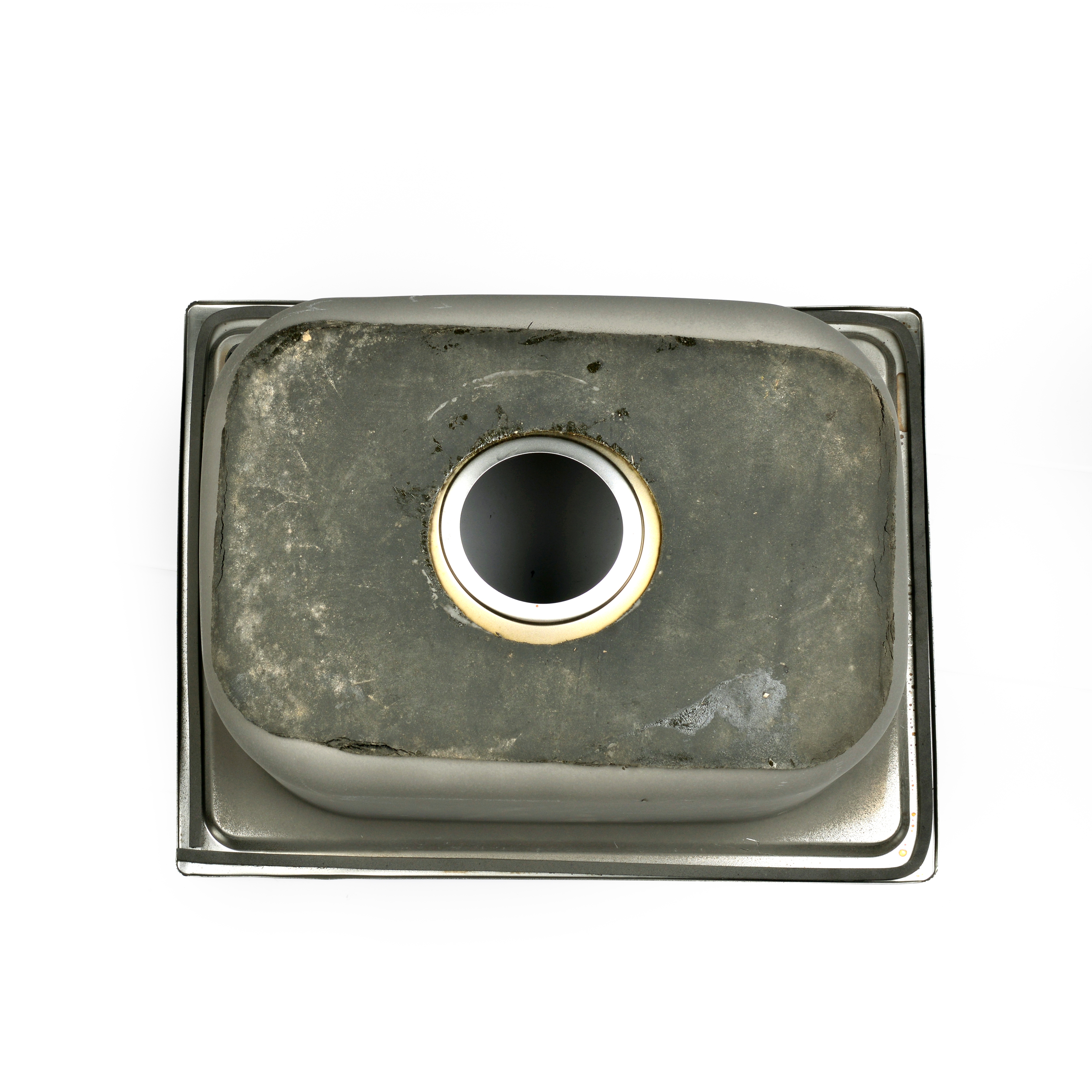 The kitchen uses a stainless steel sink for washing hands, dishes and vegetables. The sink is small details Picture