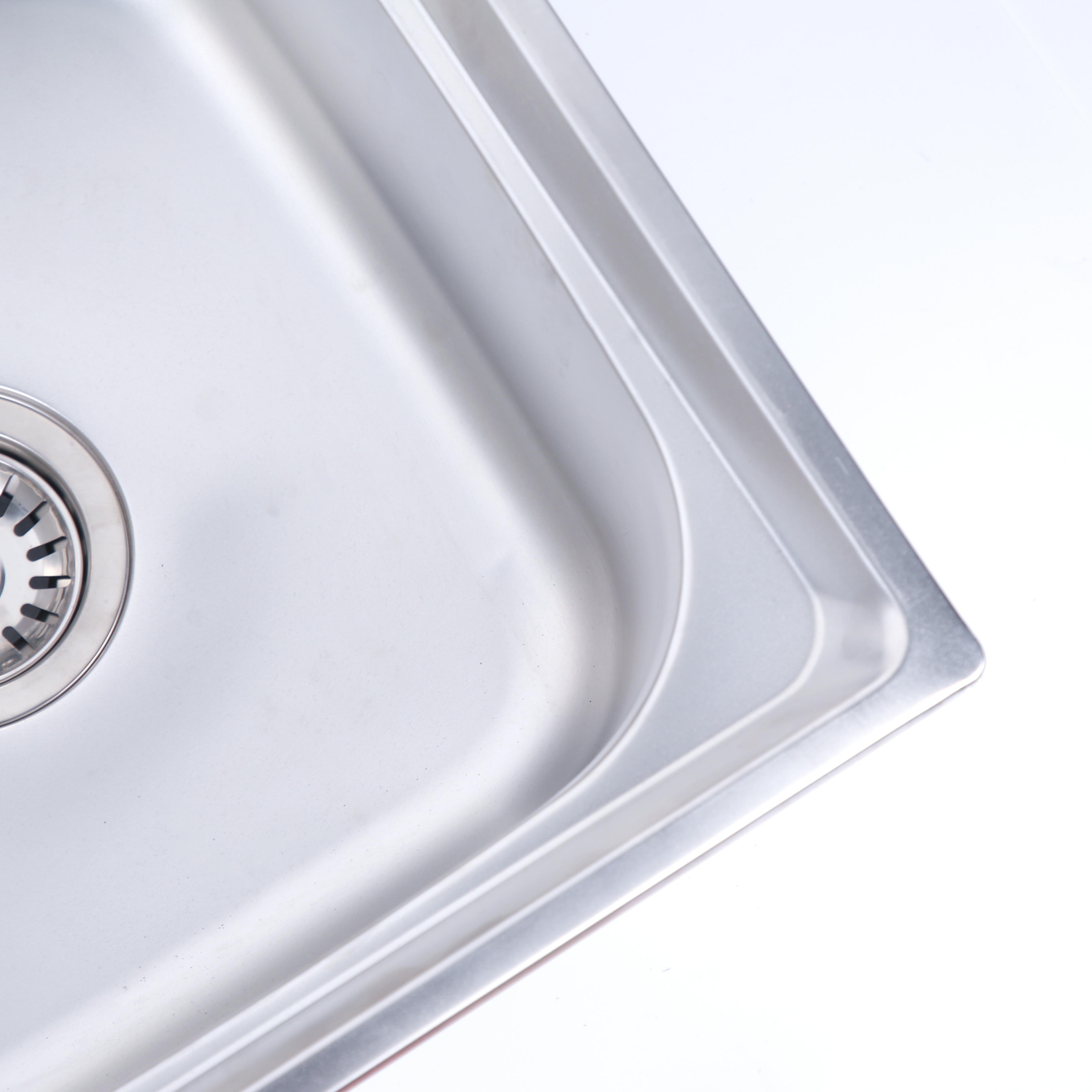 A household stainless steel sink for washing hands, dishes and vegetables in the kitchen, with a double sink Item Picture