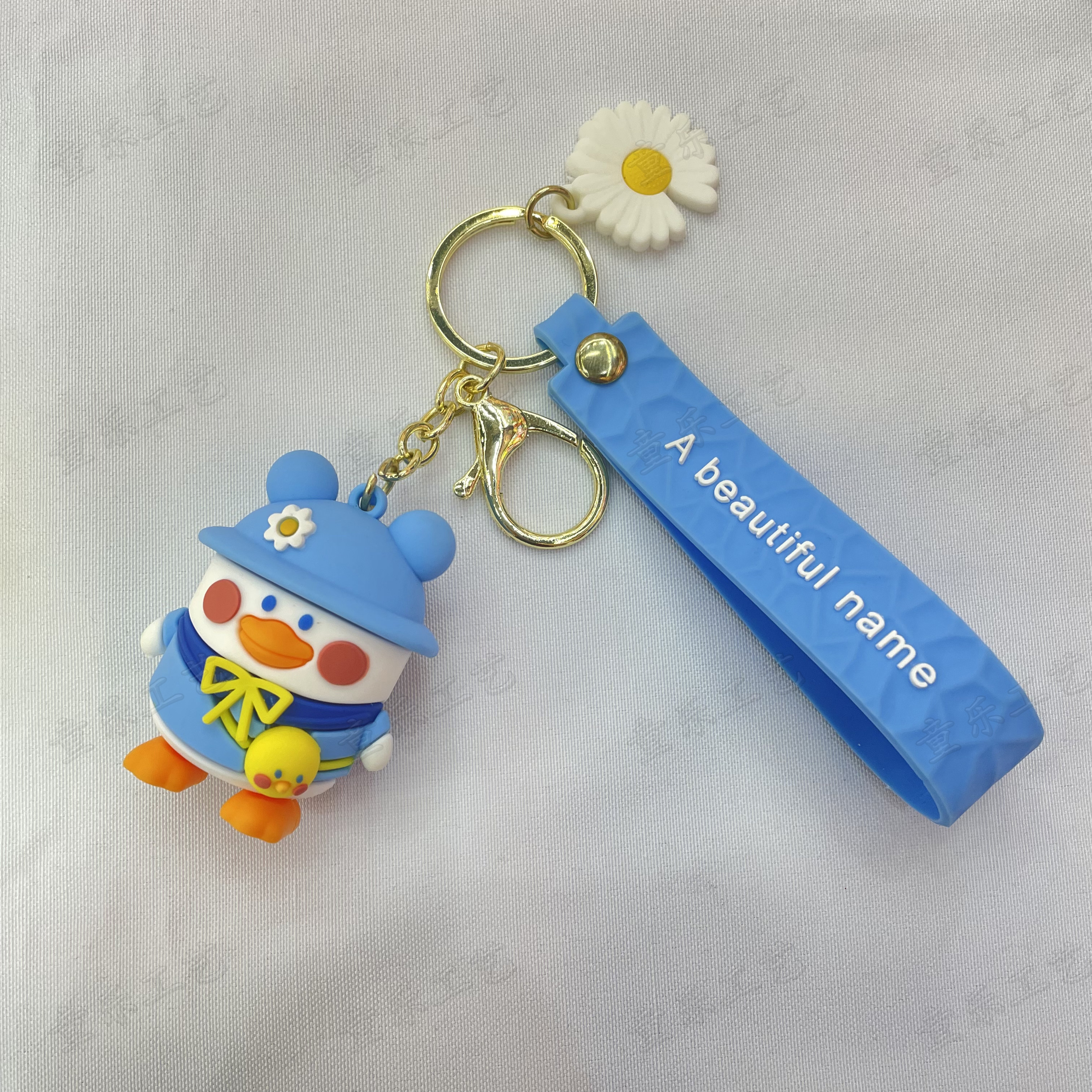 Cute cartoon Internet celebrity duck doll keychain, girls' schoolbag doll pendant, couple exquisite car key chain pendant Specification image