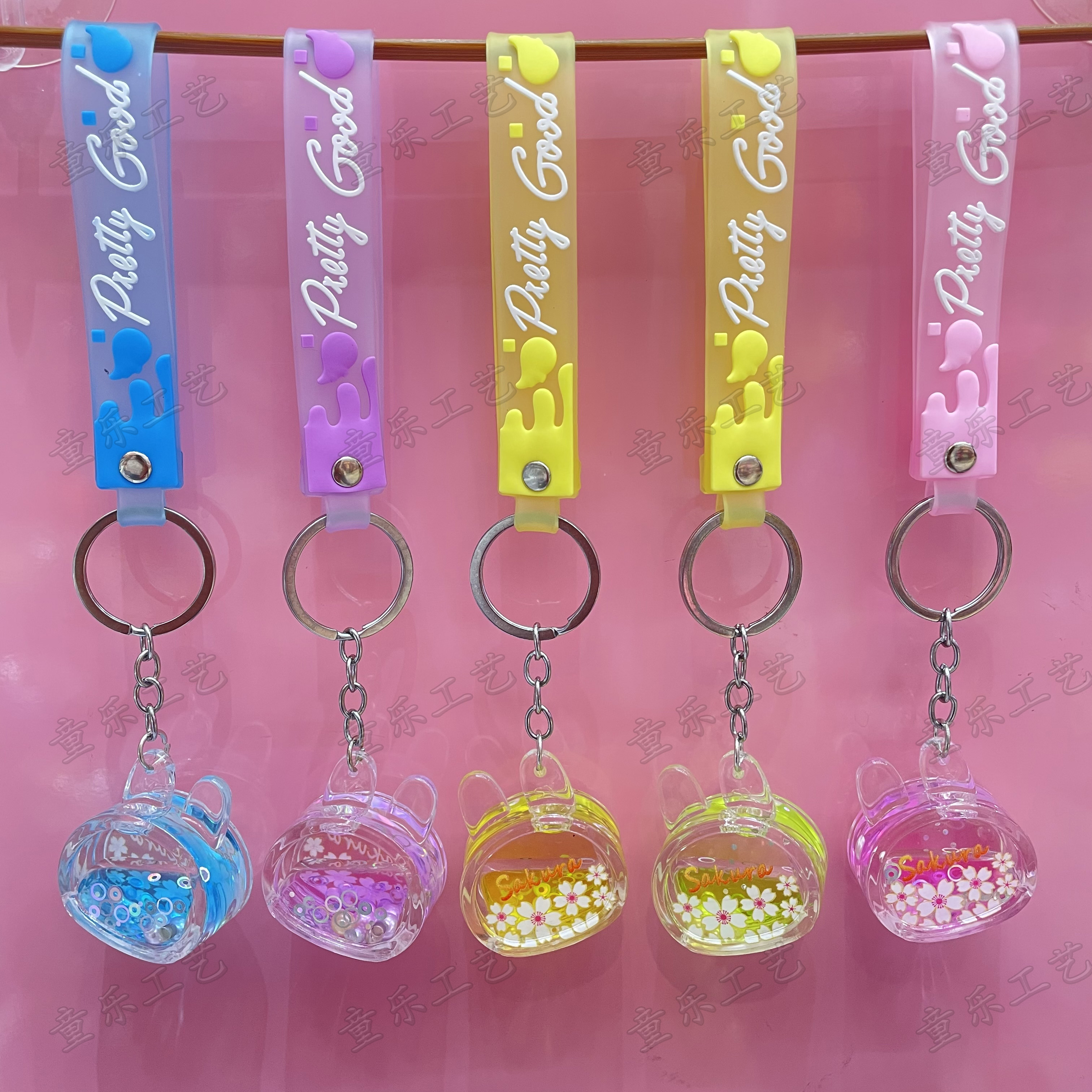 The popular "Flowing Sand" series keychains feature creative and cute animal key pendants, bag pendants, floating fruits, and animal key chains Item Picture