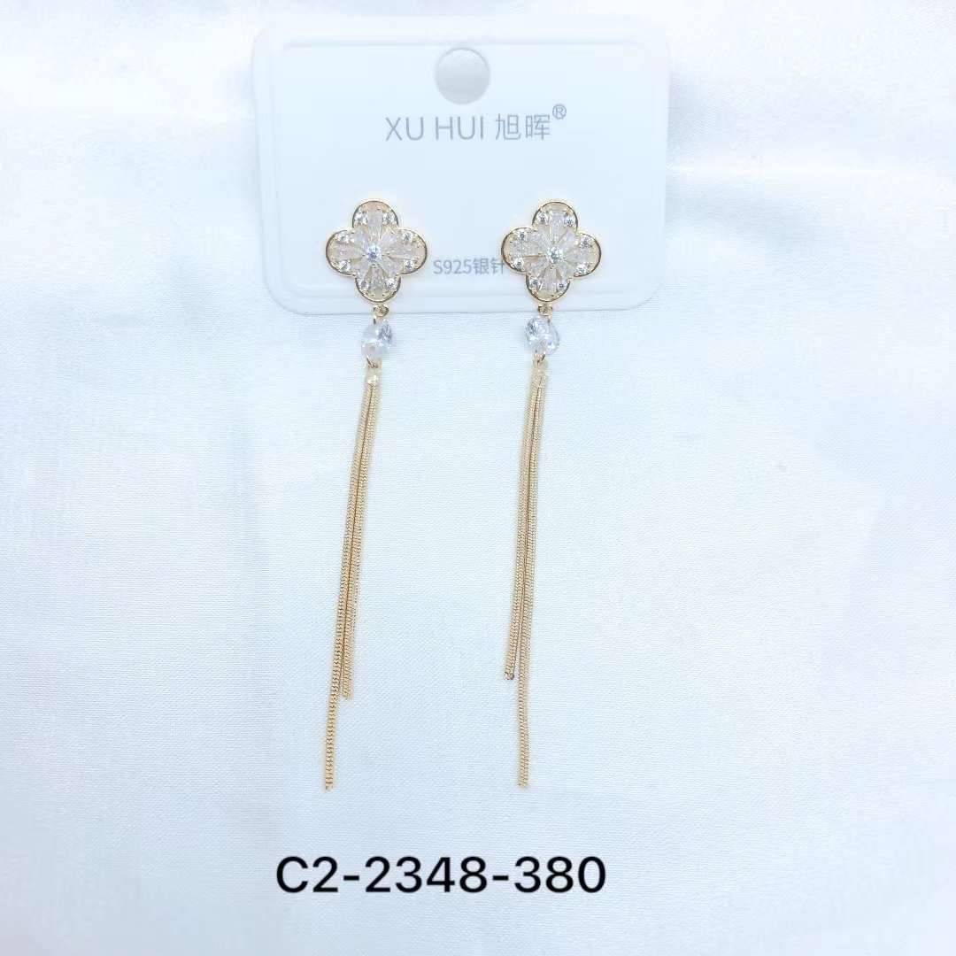 Xuhui brand's light luxury, fashionable and versatile 925 silver needle copper plated with real gold and zircon four-leaf clover tassel earrings