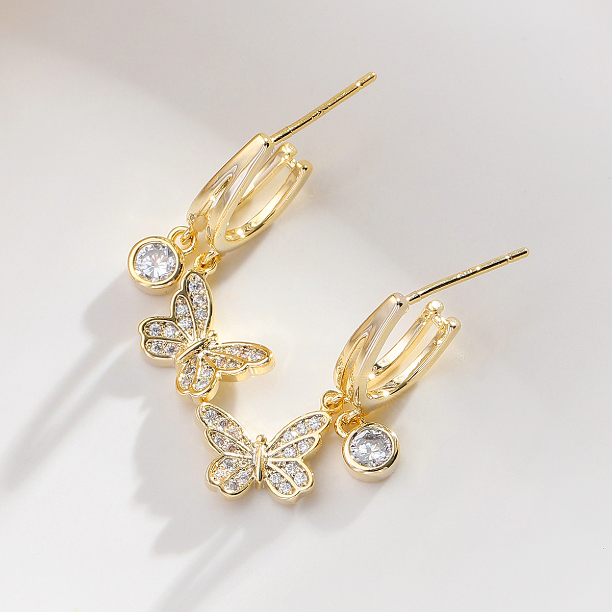 Xuhui brand's light luxury, fashionable and versatile 925 silver needle copper plated with real gold and zirconia butterfly stud earrings