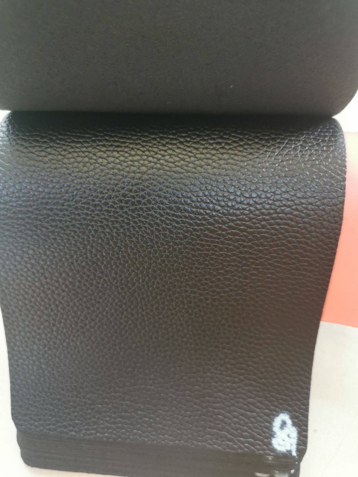 Black single-needle leather texture detail image 4