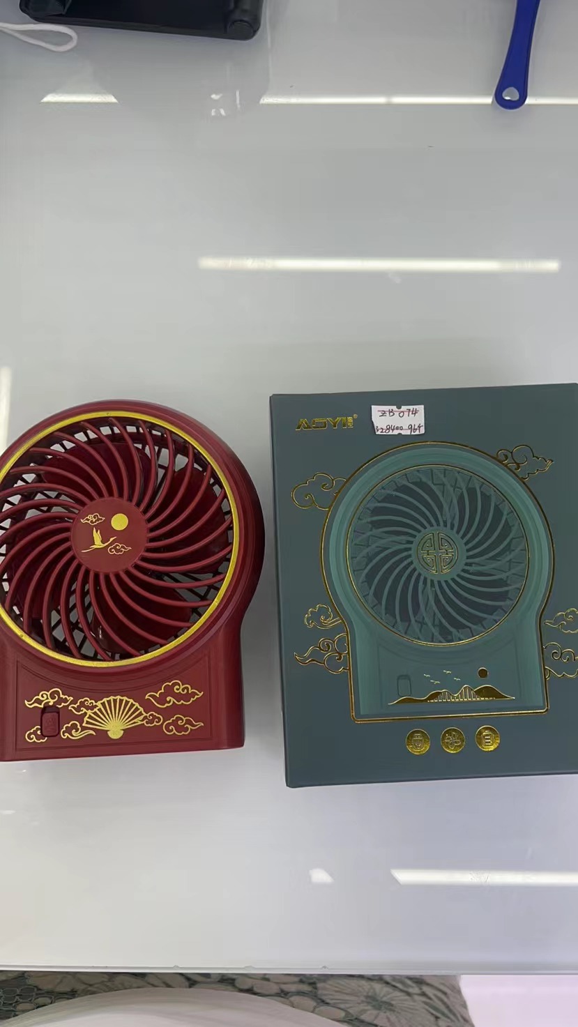 The ZB074 mini national trend charging fan has two Settings and comes in three colors: green, red and blue. It is a portable handheld fan details Picture