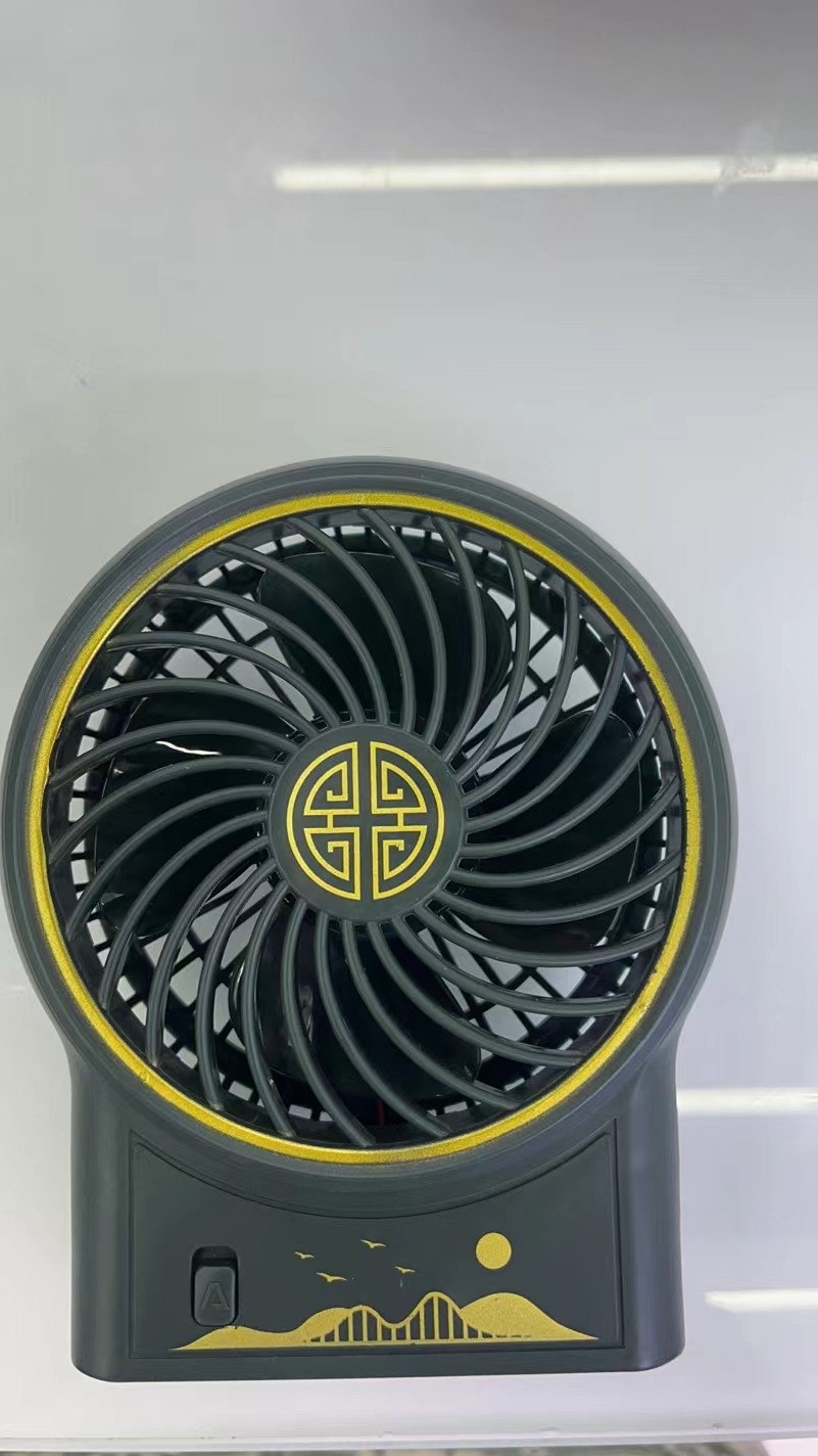The ZB074 mini national trend charging fan has two Settings and comes in three colors: green, red and blue. It is a portable handheld fan Specification image