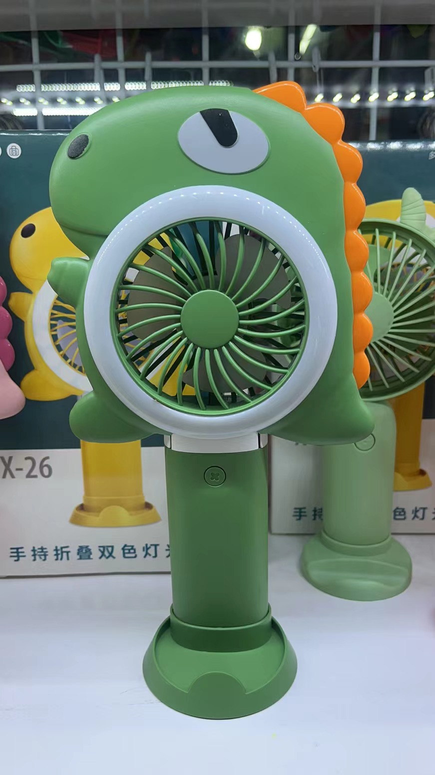 The X26 dual-color light folding fan comes in three colors: yellow, pink and green. It can be folded with three wind speeds and is convenient to carry by hand Application Scenario