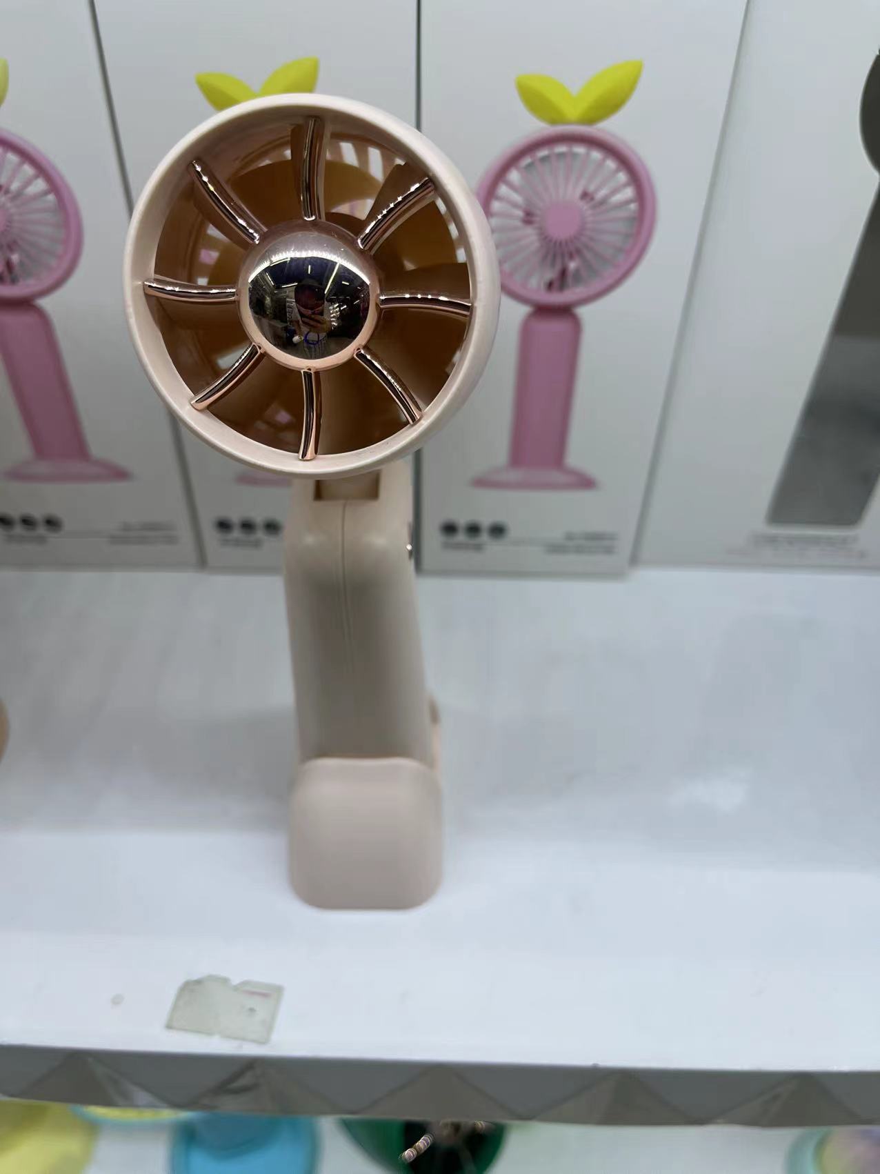 The KD-179 foldable hair dryer fan comes in three colors: white, green and pink. It is a foldable handheld fan that is convenient to carry Specification image