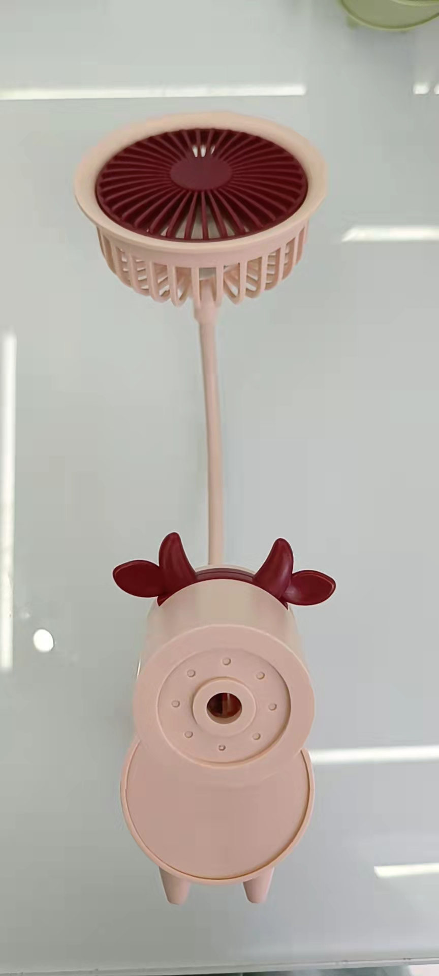 The 2196AF cartoon multi-functional fan can be used to sharpen pencils and serve as a pen holder. It comes in three colors: pink, green and blue, and can be folded Item Picture