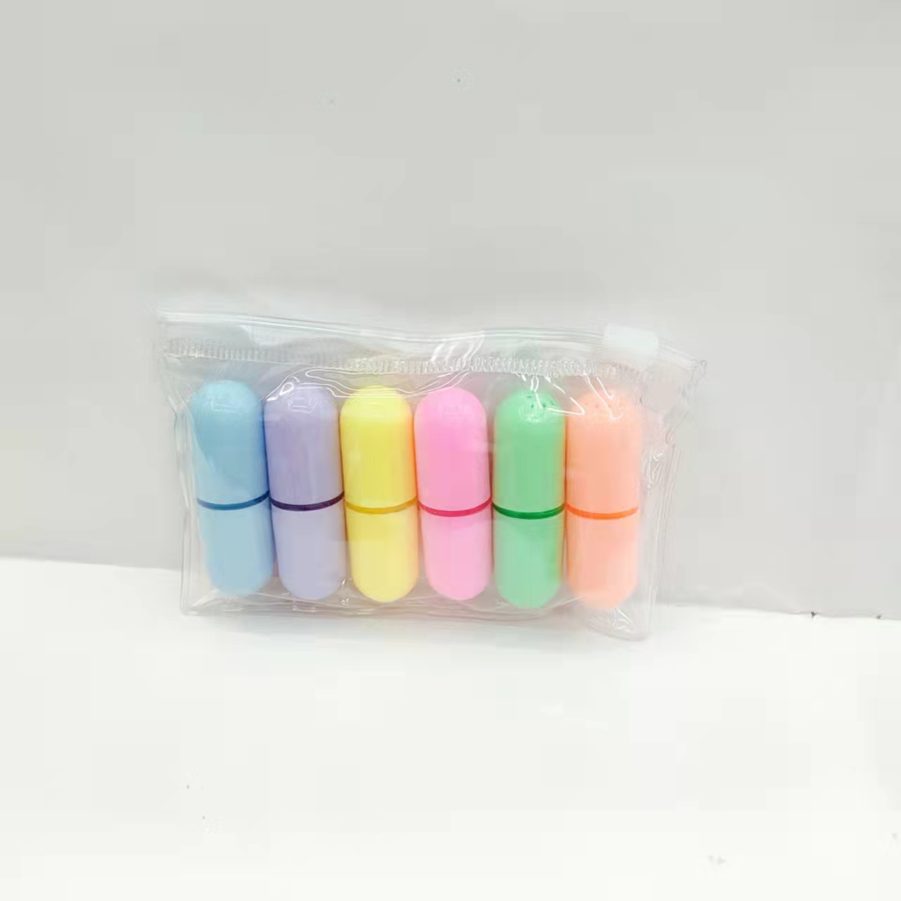 Pill-shaped colored highlighter pen, student key point marking pen, notebook pen