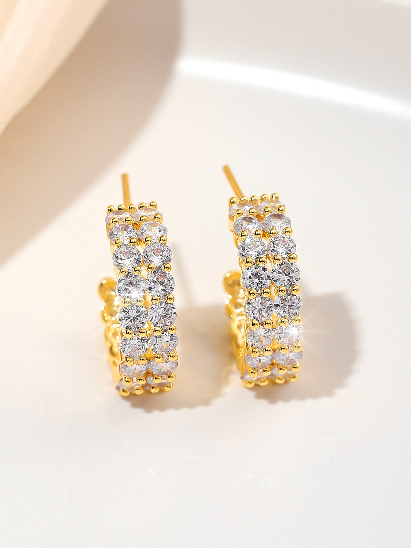 Xuhui brand exquisite and light luxury copper plated with real gold and set with zircon 925 silver needle C-shaped design fashionable stud earrings Application Scenario