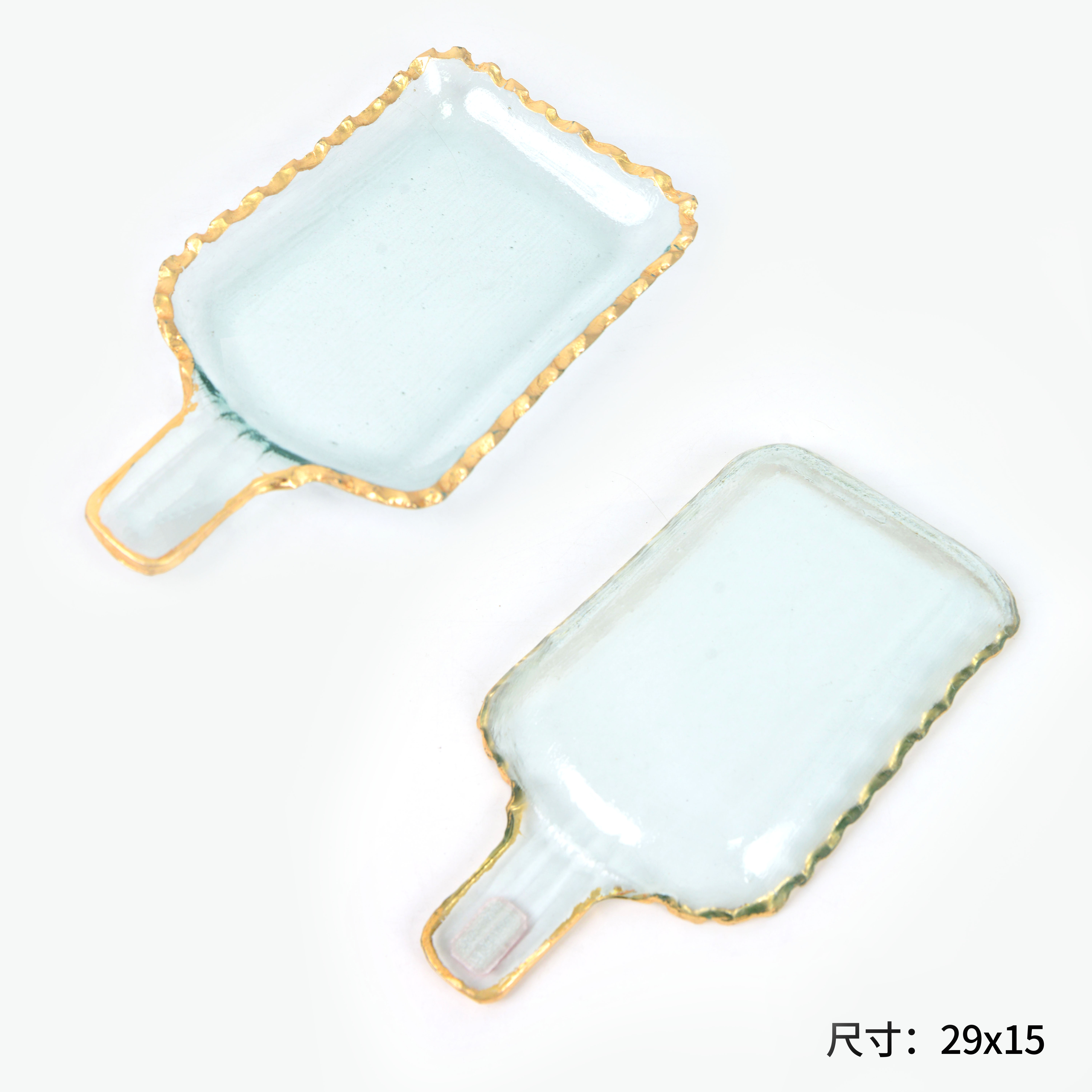 The square transparent gold-rimmed glass fruit plate has a handle Item Picture