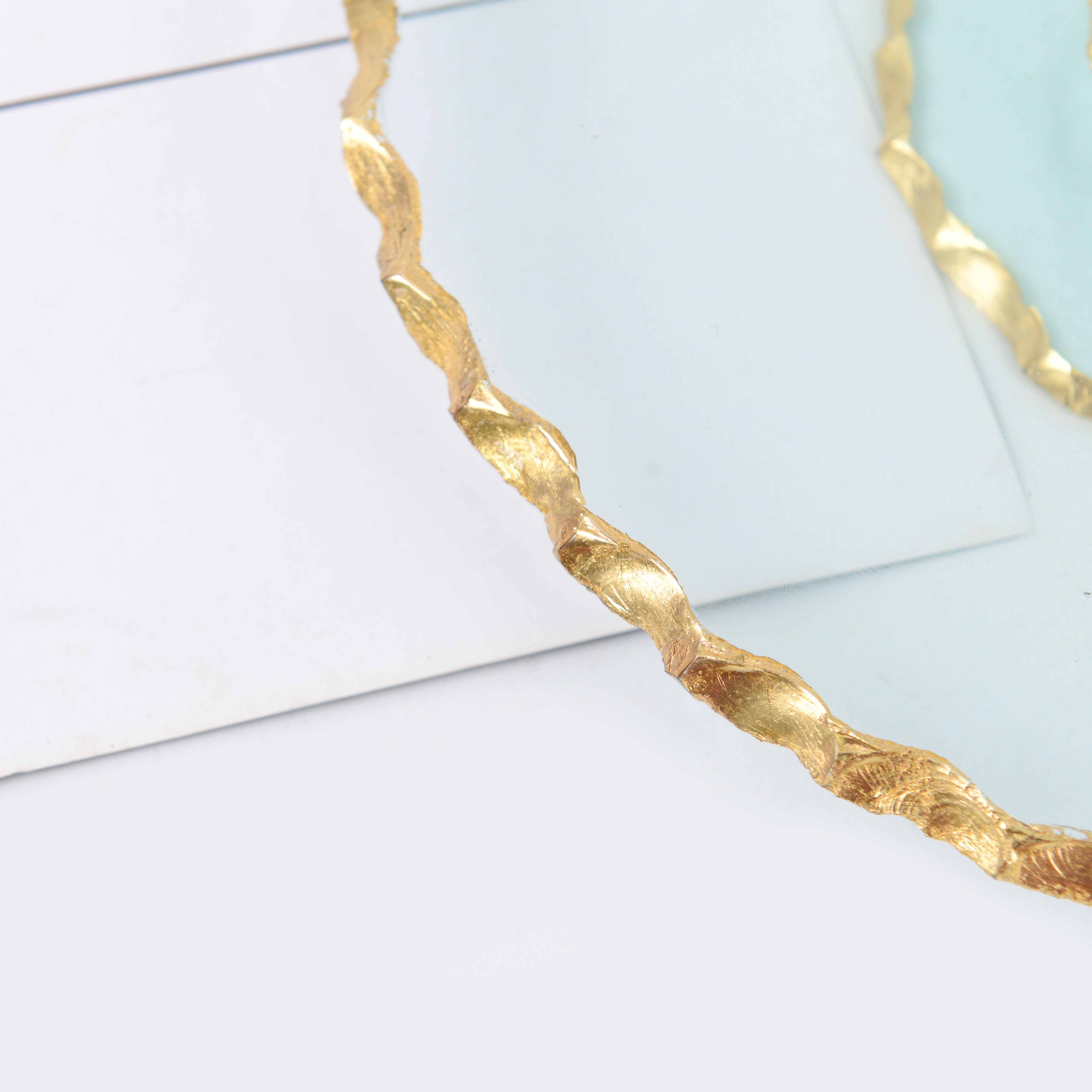 A transparent gold-rimmed glass fruit platter without handles Application Scenario