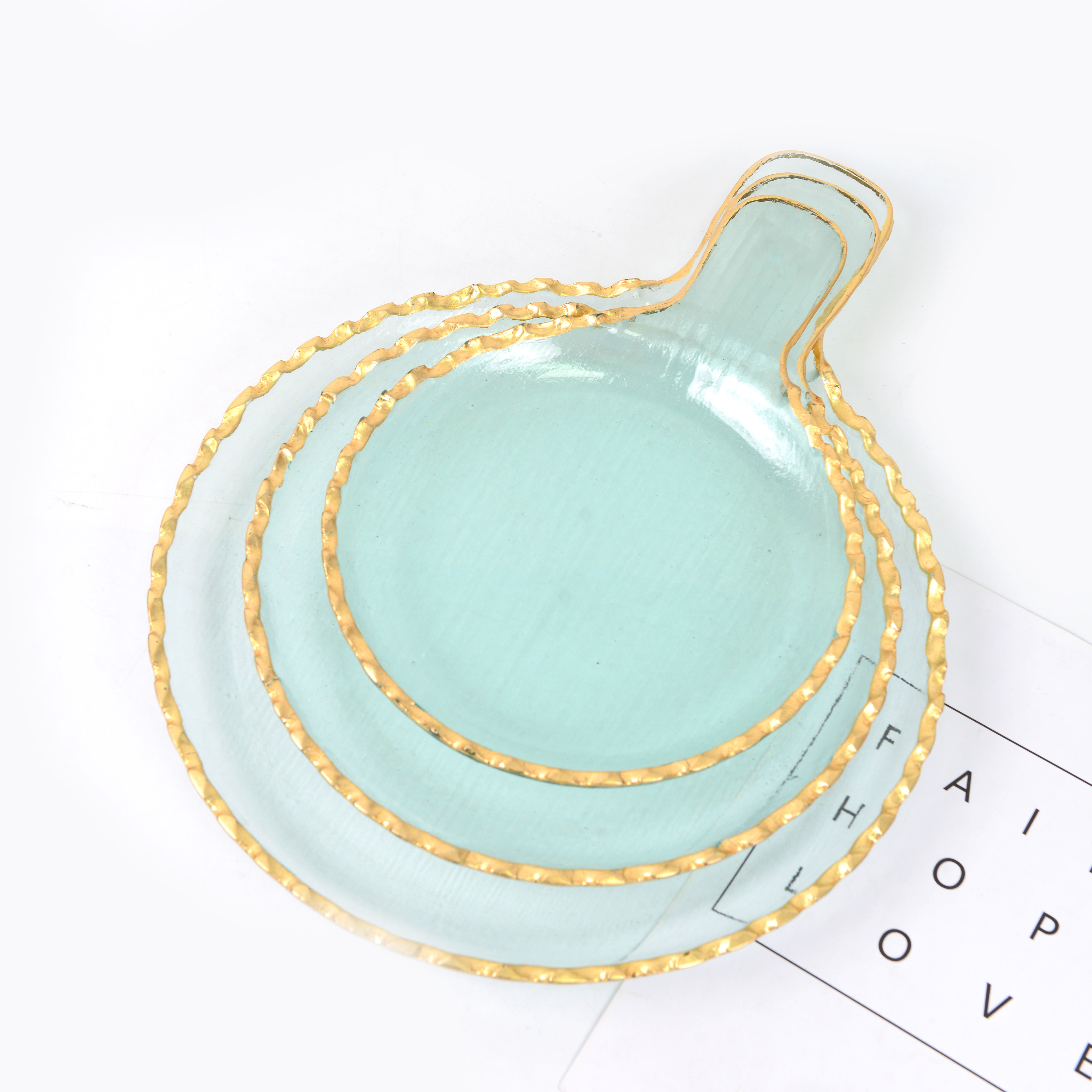 Transparent gold-rimmed glass fruit platter