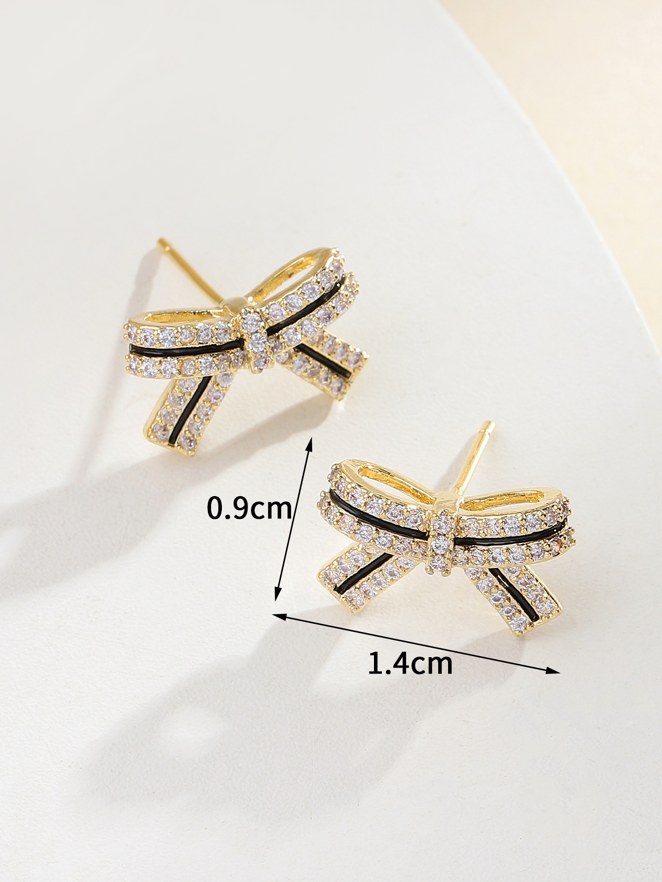Xuhui brand exquisite and light luxury copper plated with real gold and zircon inlaid 925 silver needle bow with baked paint, luxurious design and fashionable stud earrings Application Scenario
