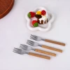 Wholesale of stainless steel clamps, wooden handles, spoons, knives, forks and household tableware from the manufacturer. Xu Shengyou Item Picture