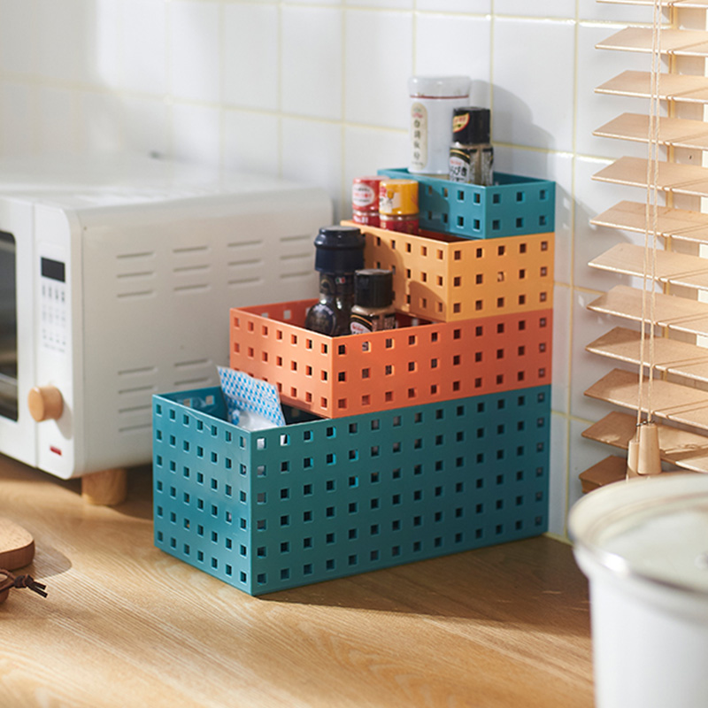 Household kitchen plastic storage basket, multi-functional desktop for storing miscellaneous items, blue snack and toy storage basket Application Scenario