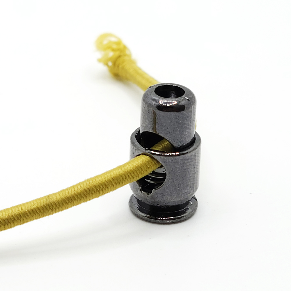 Alloy rope buckle, pill-shaped spring buckle, elastic band adjustment buckle, special-shaped pressing alloy buckle chain pendant clock Application Scenario
