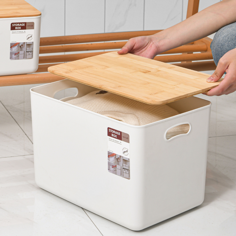 Five sizes of white bamboo-covered storage boxes