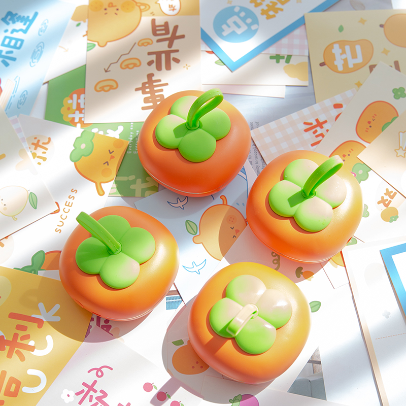柿子按摩暖手/办公学习礼品/柿柿暖宝宝产品图