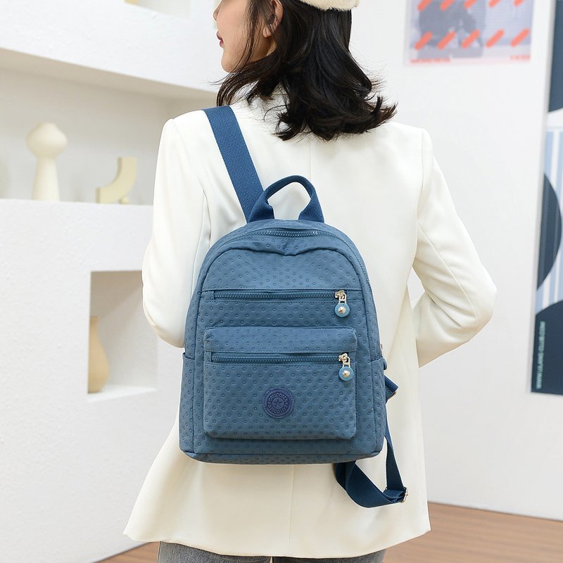 Korean-style simple and fashionable travel and shopping women's backpack, nylon bag, casual backpack, new women's bag, waterproof Oxford fabric, large capacity, multi-purpose women's bag Application Scenario