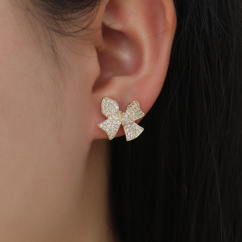 Korean-style exquisite, simple and versatile, ethereal small bow earrings, stud earrings, pendants and feather butterfly Application Scenario